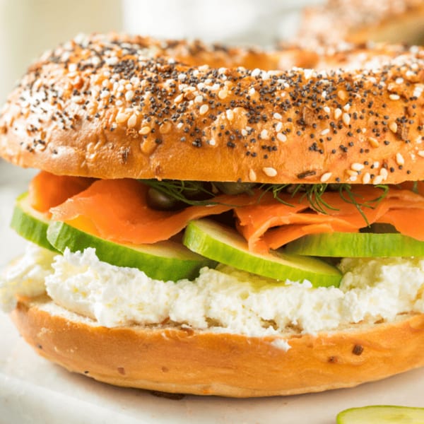 Everything bagel with cream cheese, smoked salmon, cucumber, capers, and dill.