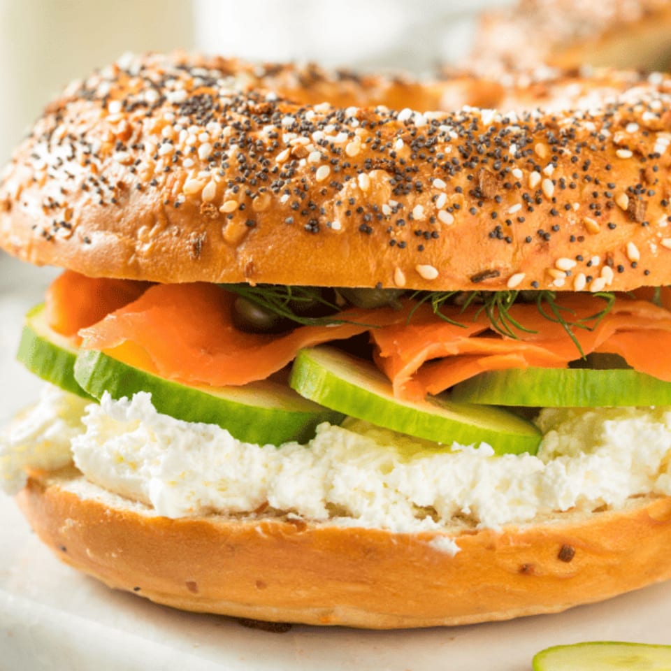 Everything bagel with cream cheese, smoked salmon, cucumber, capers, and dill.